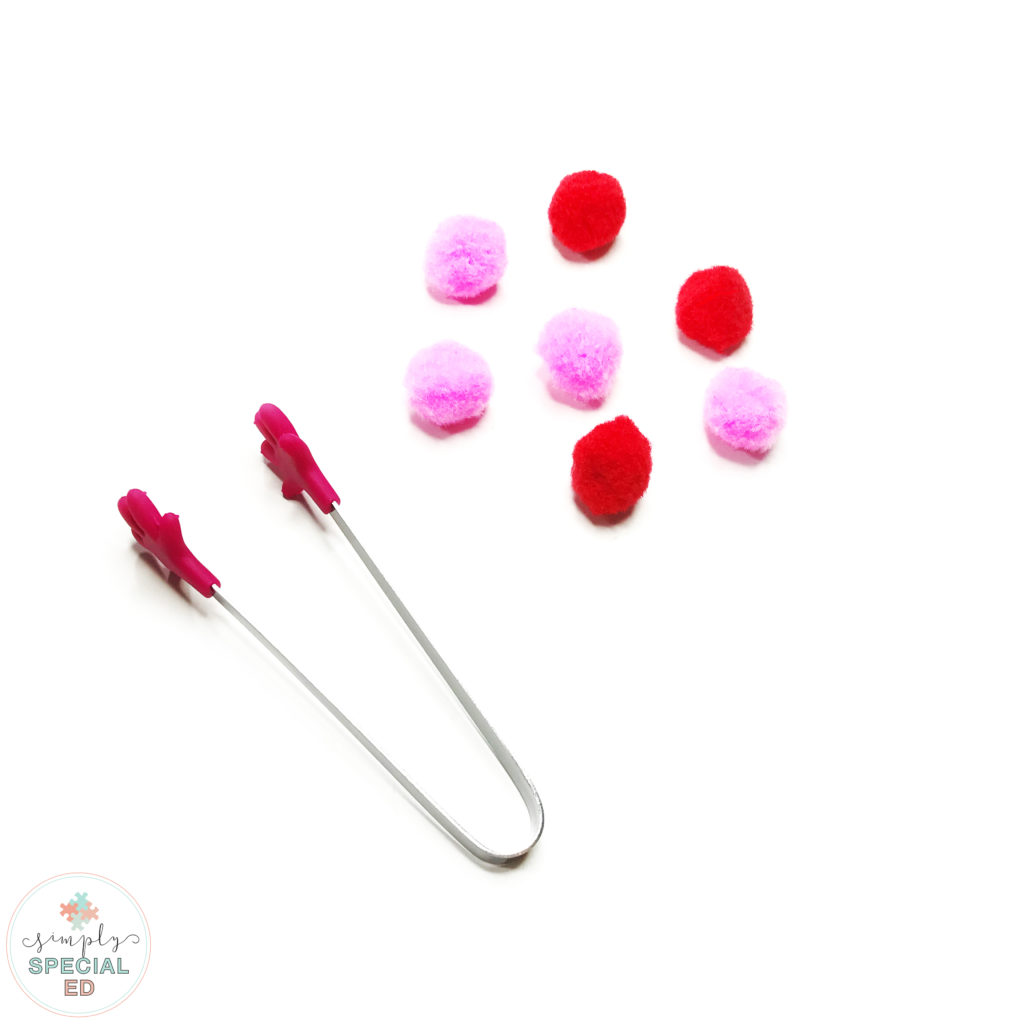 hand-shaped tongs and pom poms