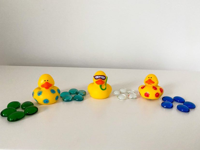 rubber ducks and pebbles 