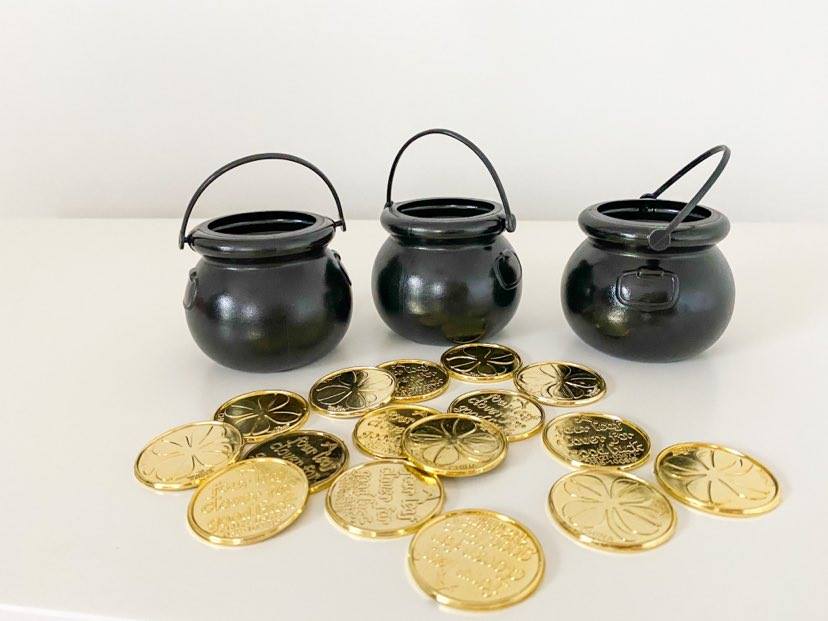 plastic coins and small cauldrons 