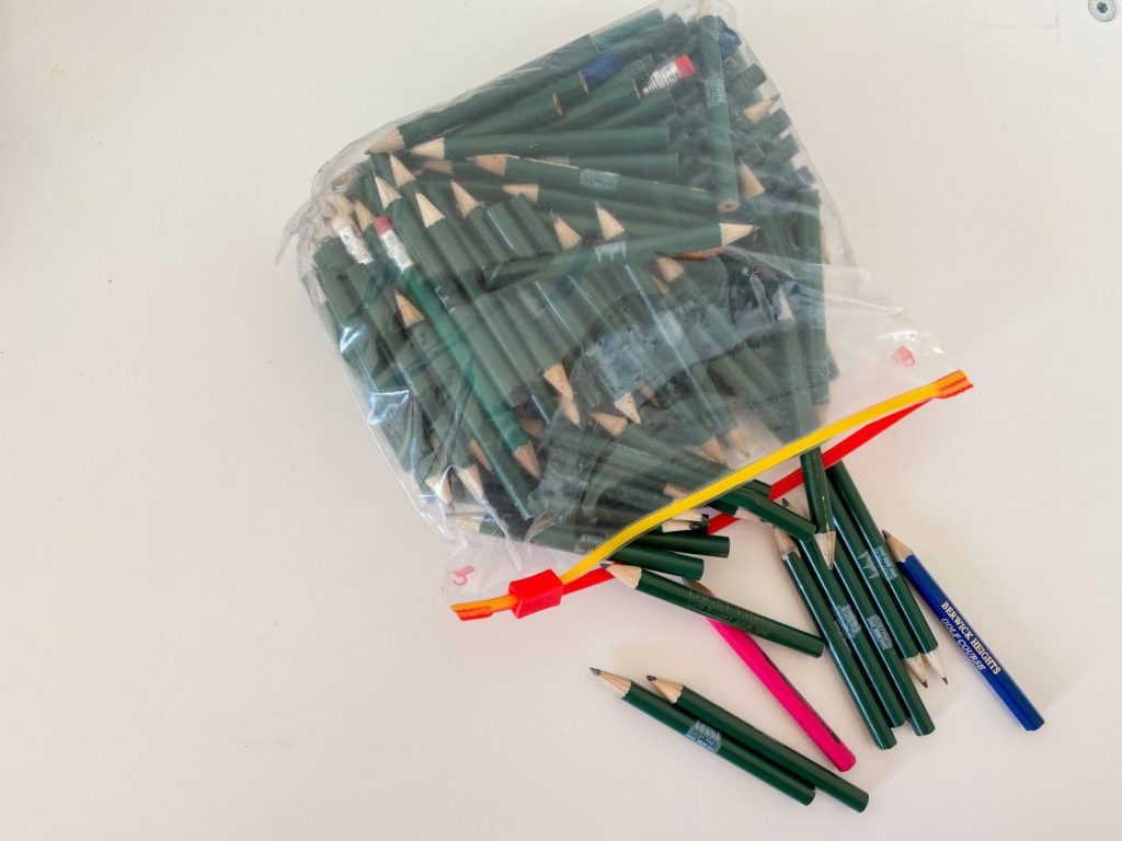 Multiple golf pencils in a ziplock bag 