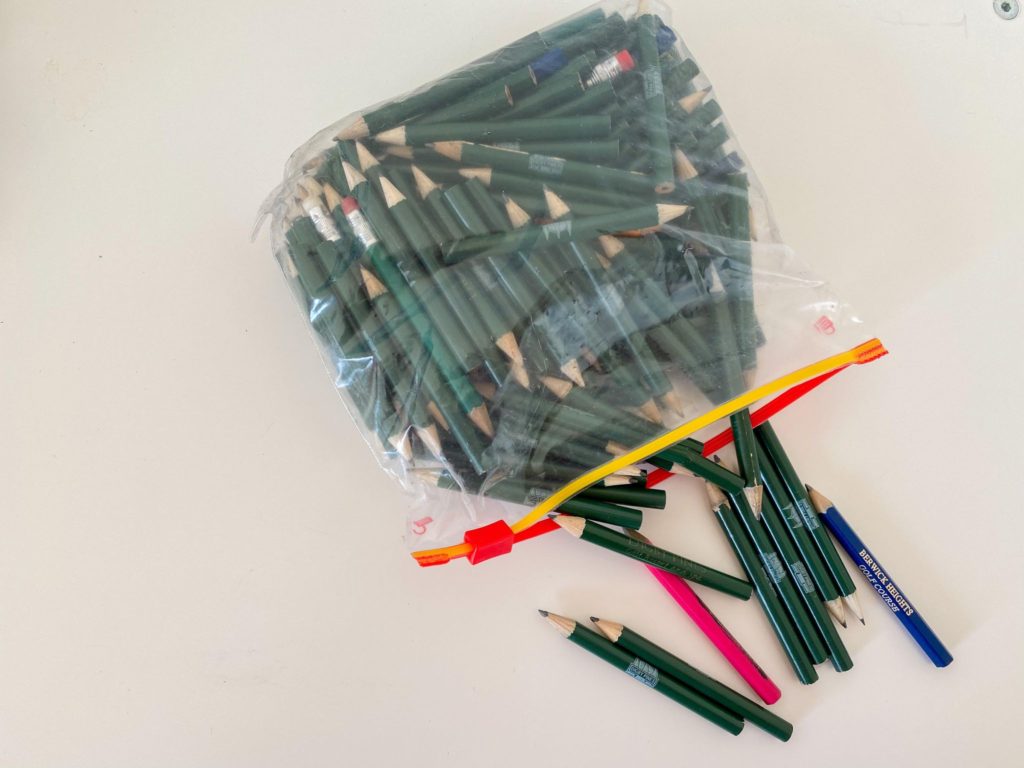 Multiple golf pencils in a ziplock bag