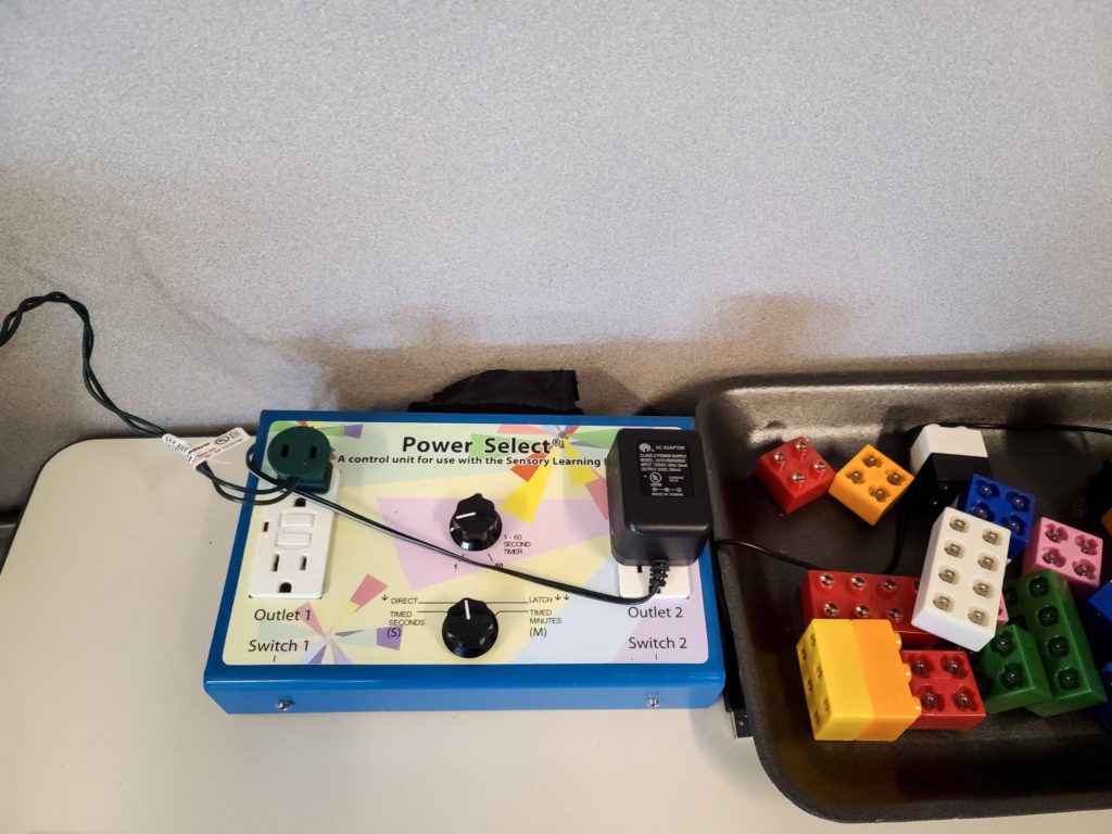 Picture of a powerlink with lights and light up blocks connected to it.