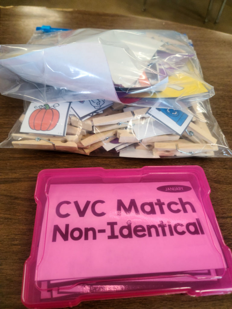 Picture of a photo keeper box and plastic baggie.