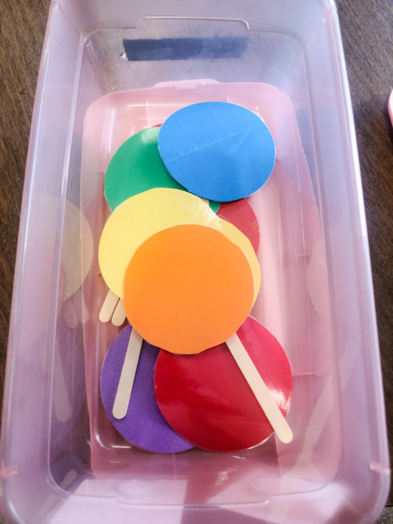 Image of a rectangular box containing colored circles.