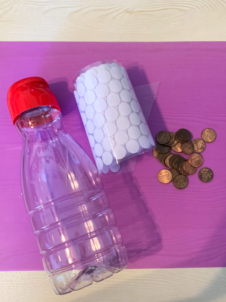 Task Box with Pennies and Velcro in a Coffee Creamer container