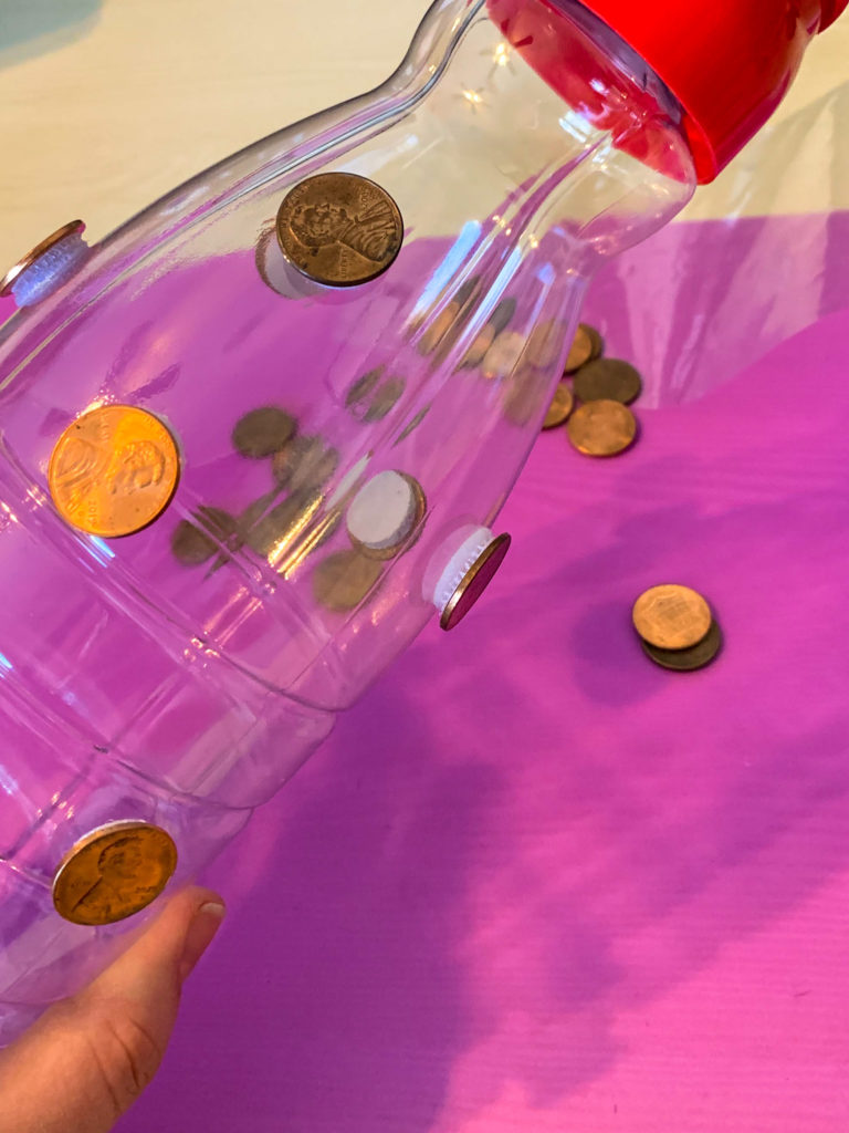 Task box using pennies and velcro dots