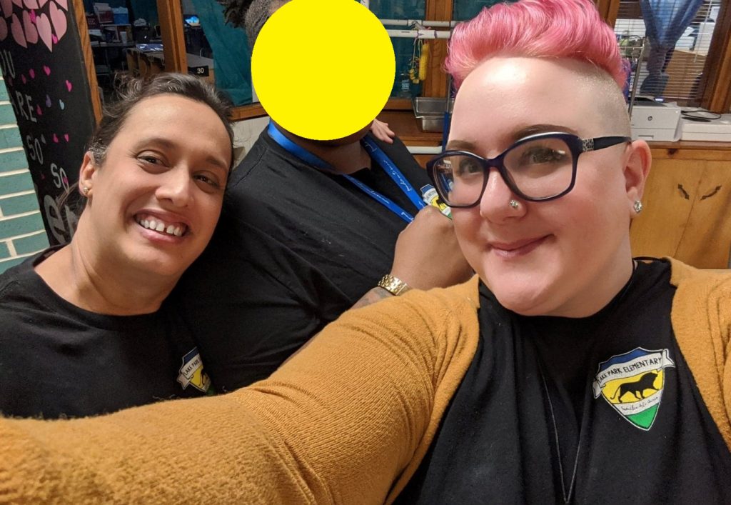 Picture of two teachers smiling.