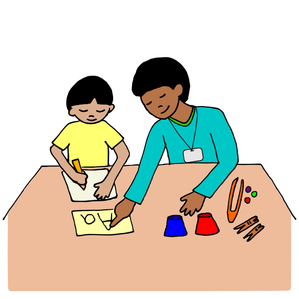 a teacher and student working together at a table.