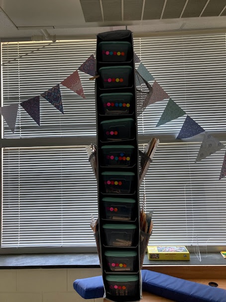 Task boxes and file folders are kept in this corner of the room.