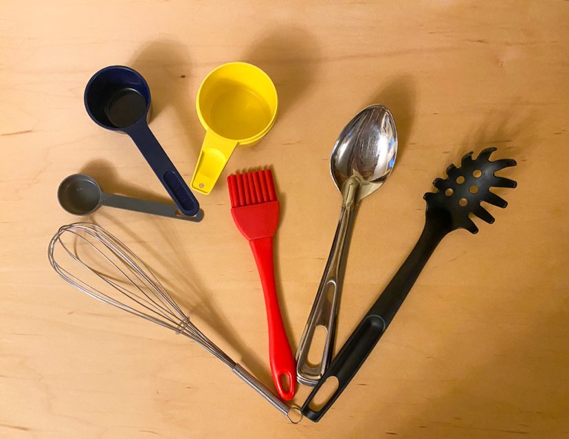 A variety of spoons and measuring cups 