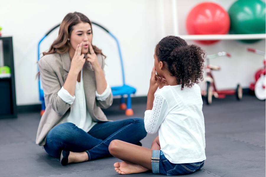 A child receiving speech therapy.