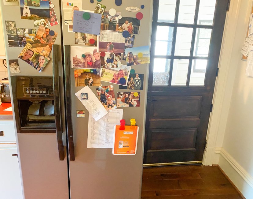 picture of a refrigerator with pictures and schedules 