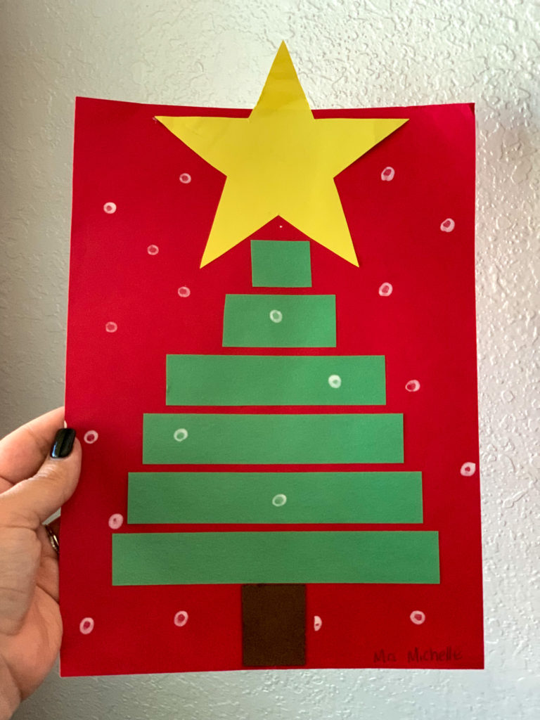 This is a Christmas tree craft made out of small-large strips of paper.