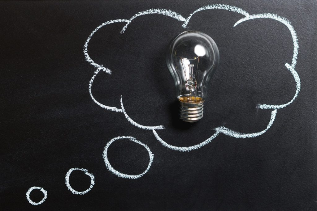 This is a photo of a light bulb in a though bubble to resemble thinking.