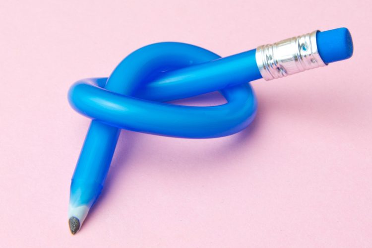This is a photo of a blue pencil tied in a knot