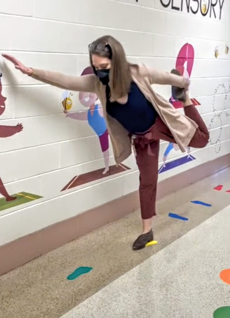 author doing a yoga pose as part of the sensory path