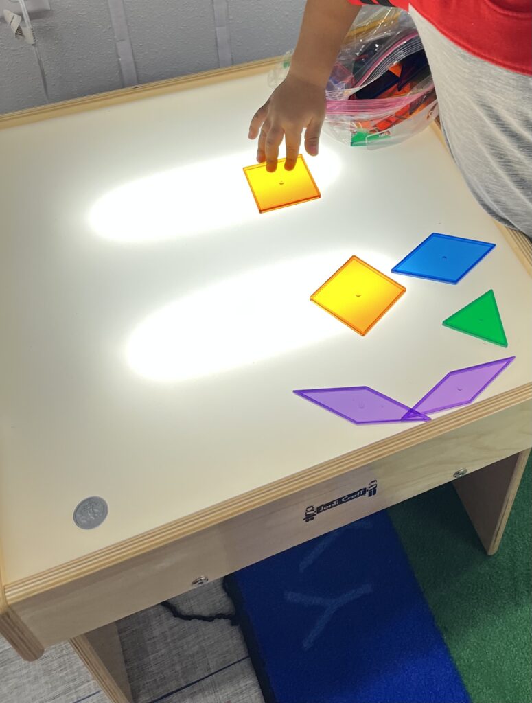 Light table with transparent shapes. 