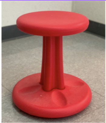 red wobble stool that can be used with sensory seekers