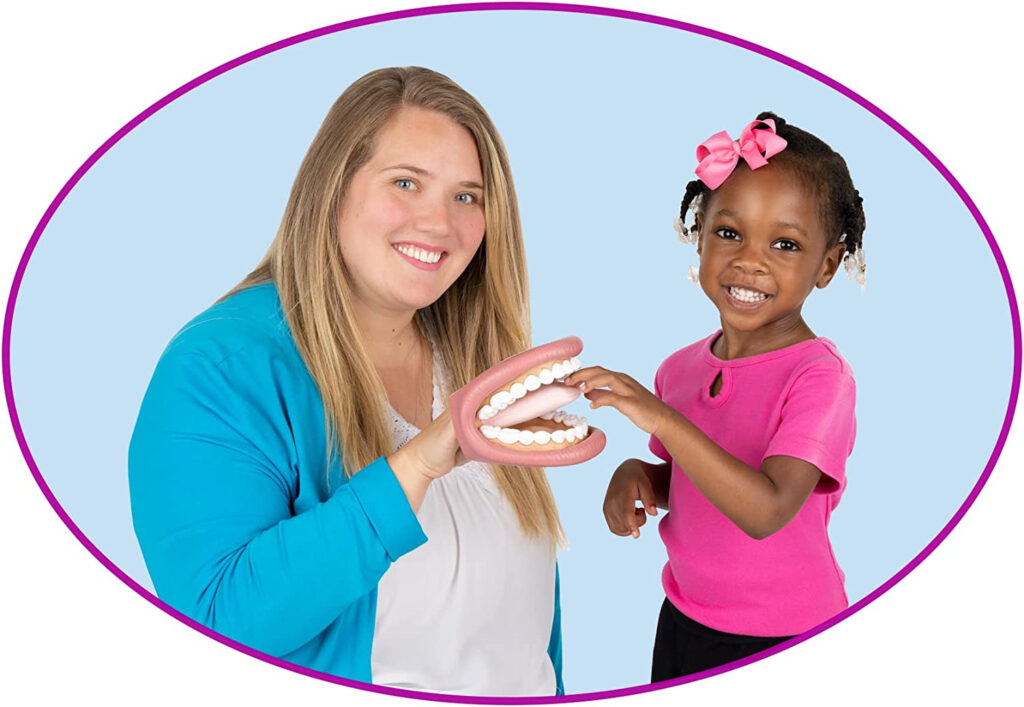 This is a picture of an SLP and child using a Jumbo Mighty Mouth. 