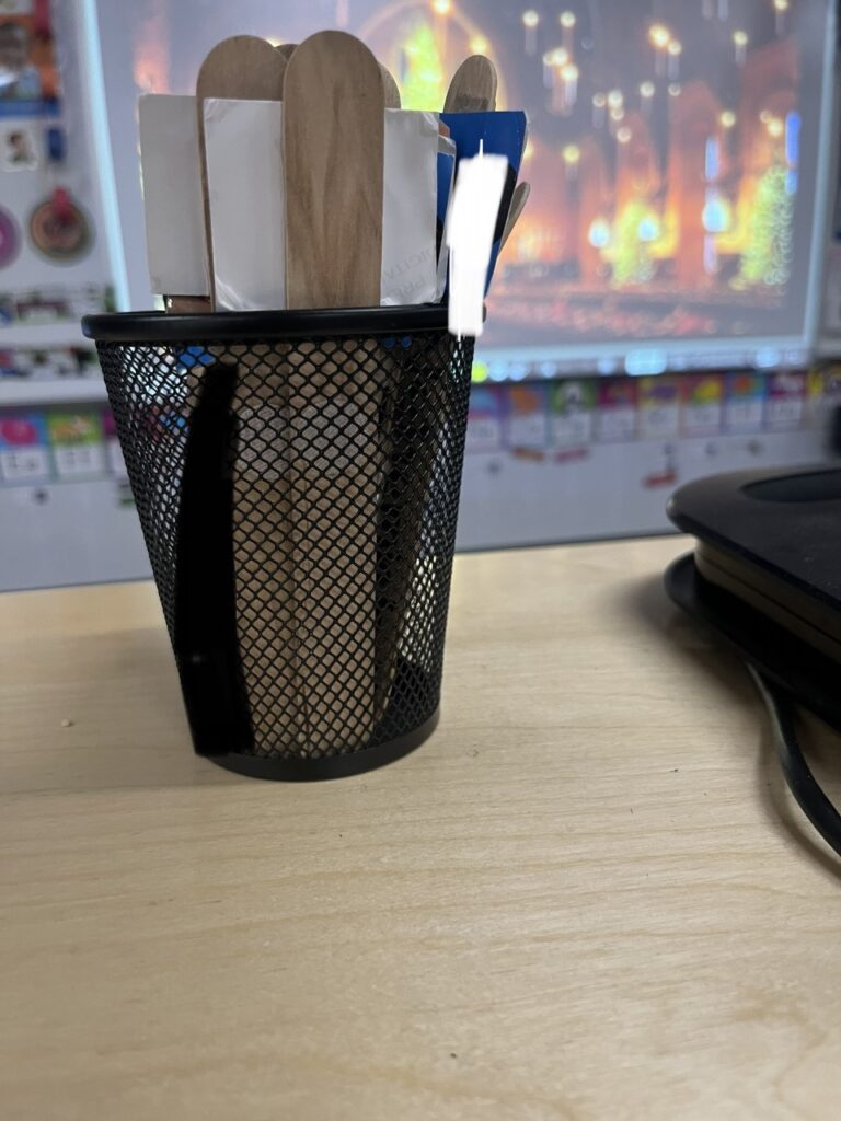 Popsicle stick with student name and picture