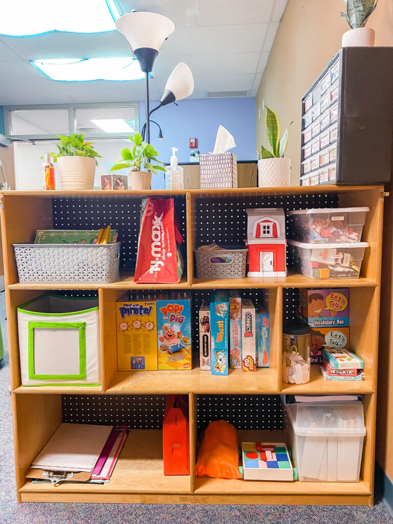 Bookshelf with games and toys organized for easy access