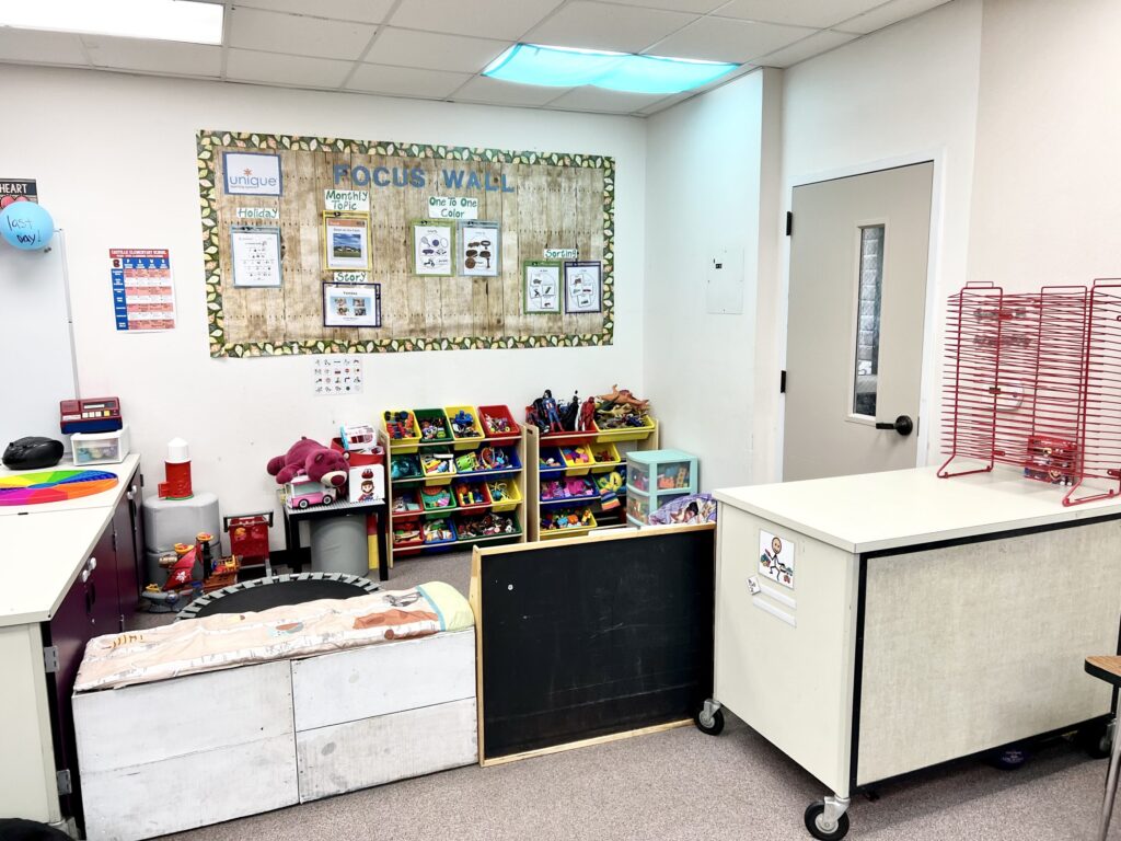 play area with toys and trampoline