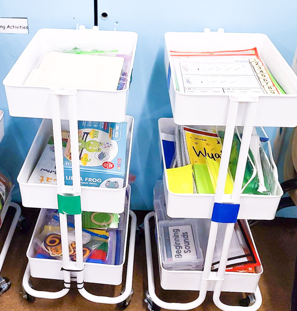 white carts with education activities on them