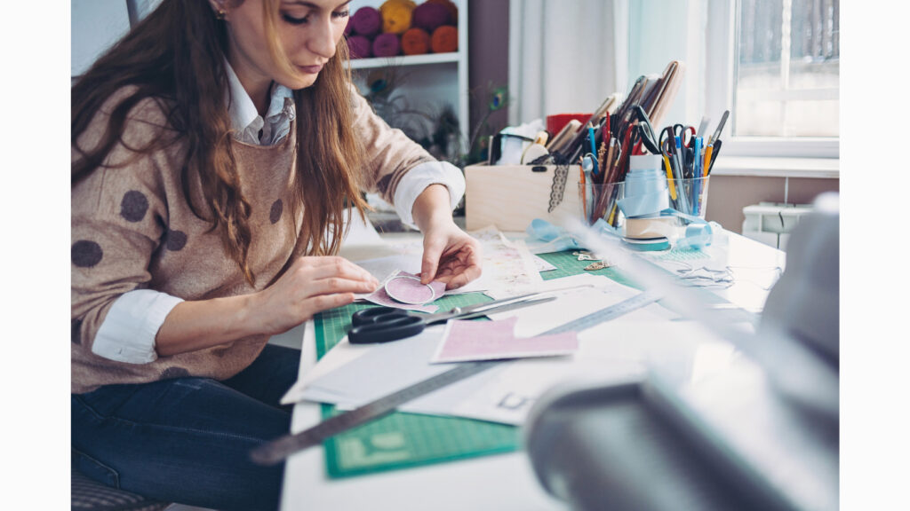 teacher preparing for a task box center