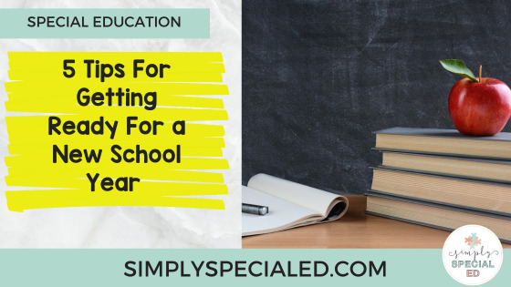 Image of chalkboard with stack of books and an apple on top. Next to the stack of books there is a notebook open to a blank page with a pen laying on it. 