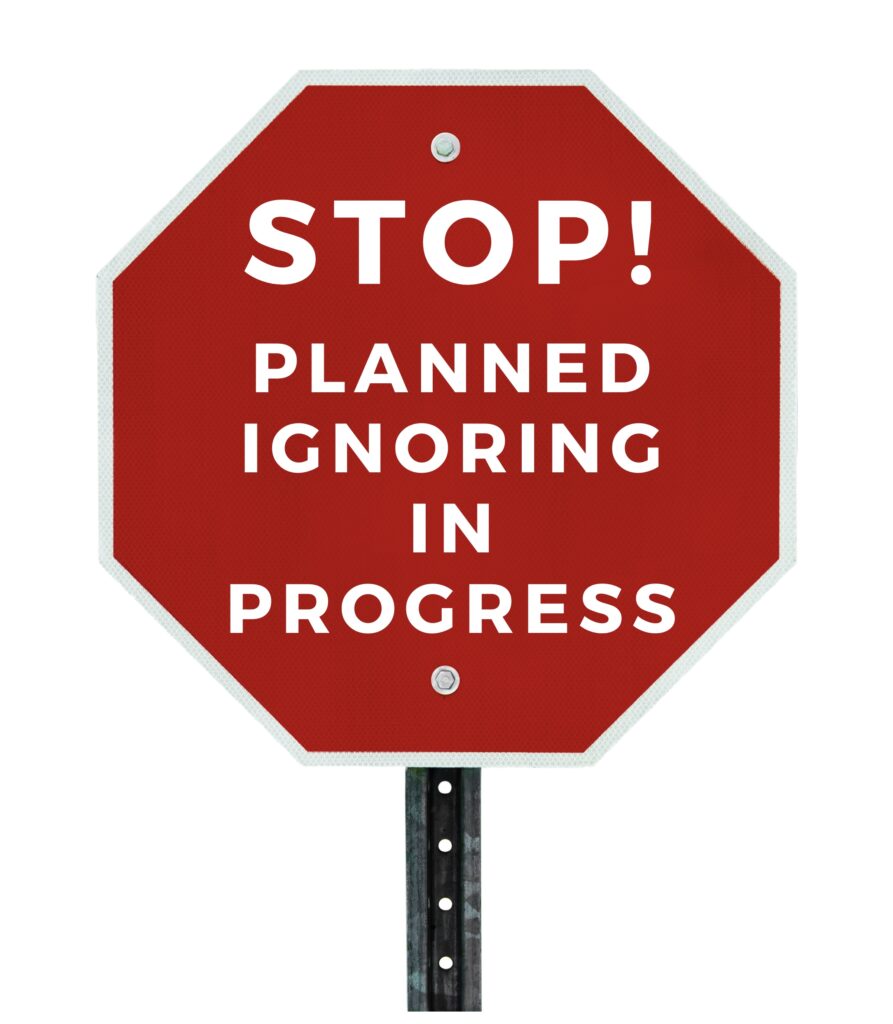 Red stop sign with the words “stop! Planned ignoring in progress”