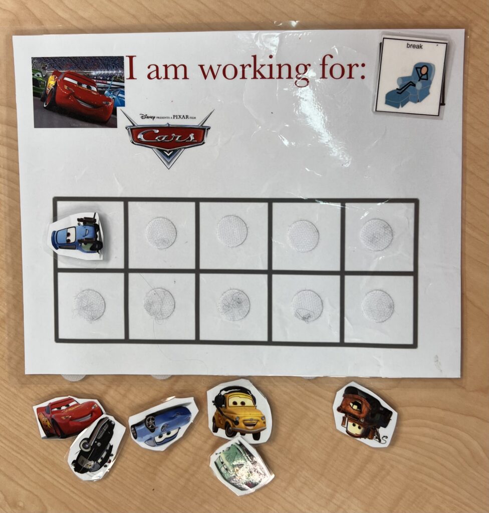 Token board with the theme cars for using to reinforce behaviors like when using planned ignoring 
