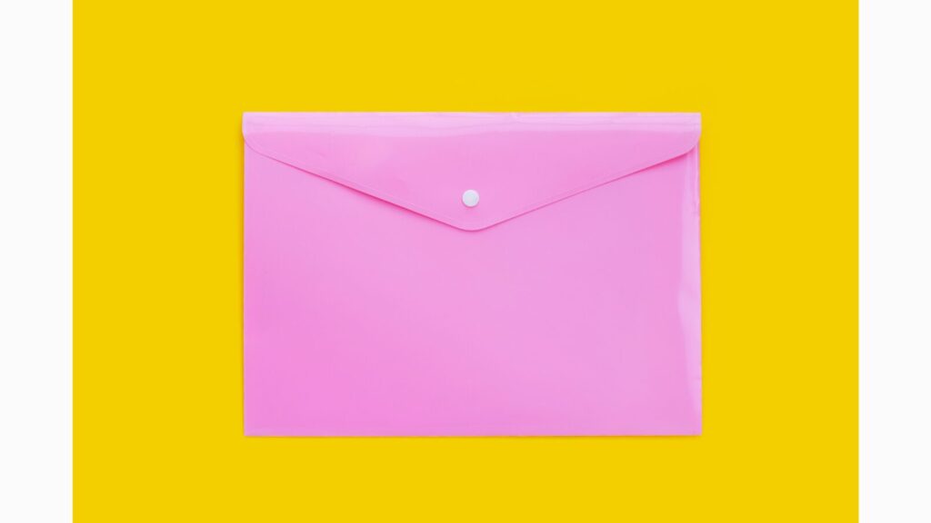 Image of a pink plastic envelop with a snap-button flap 
