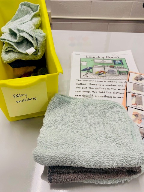 The materials for a life skills center where students will practice folding washcloths