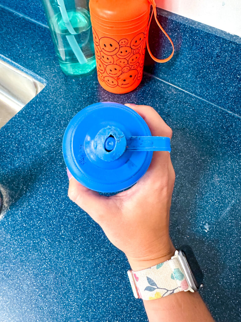 chewed water bottle top