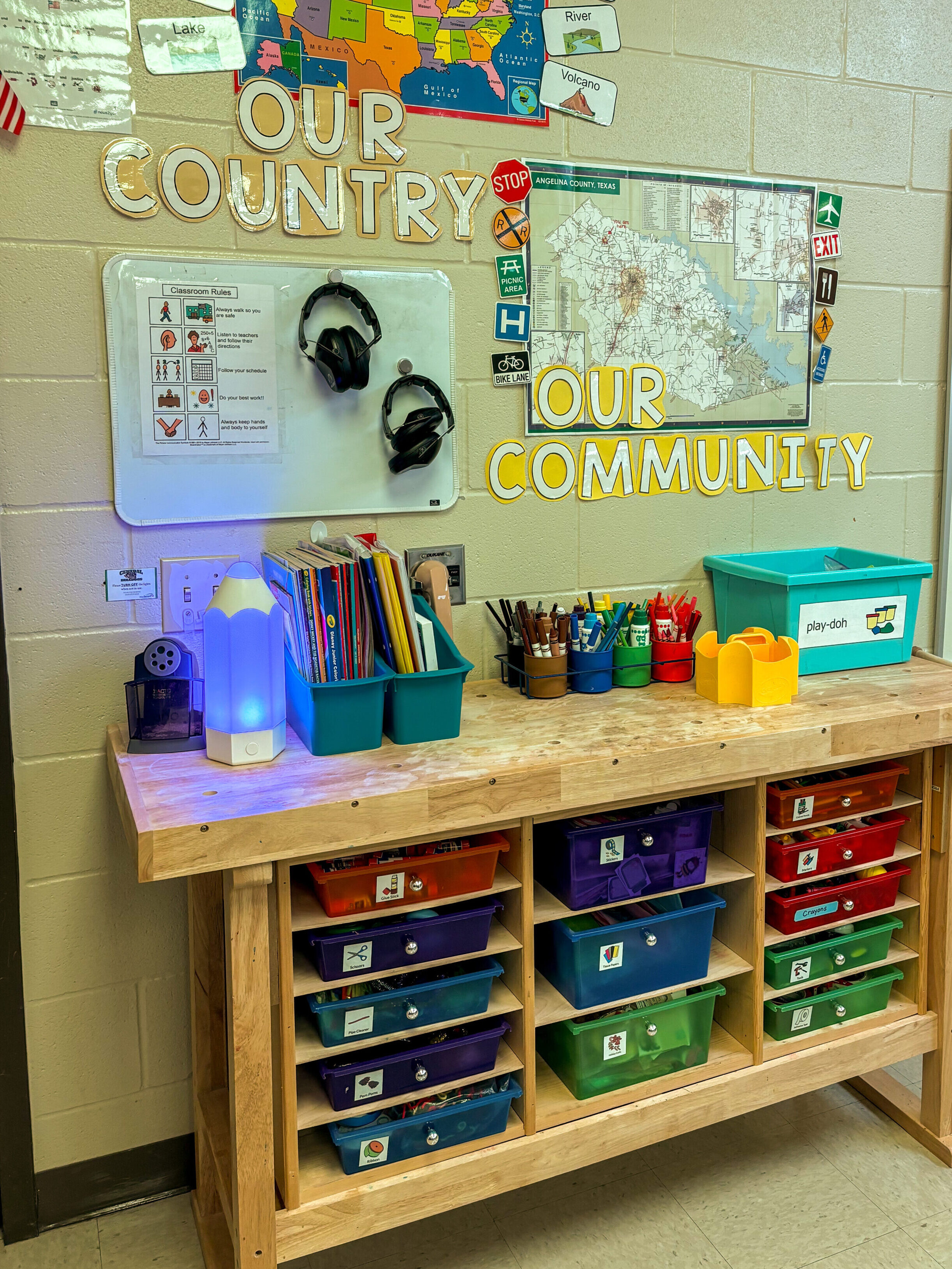 supply table with colorful drawers house student supplies