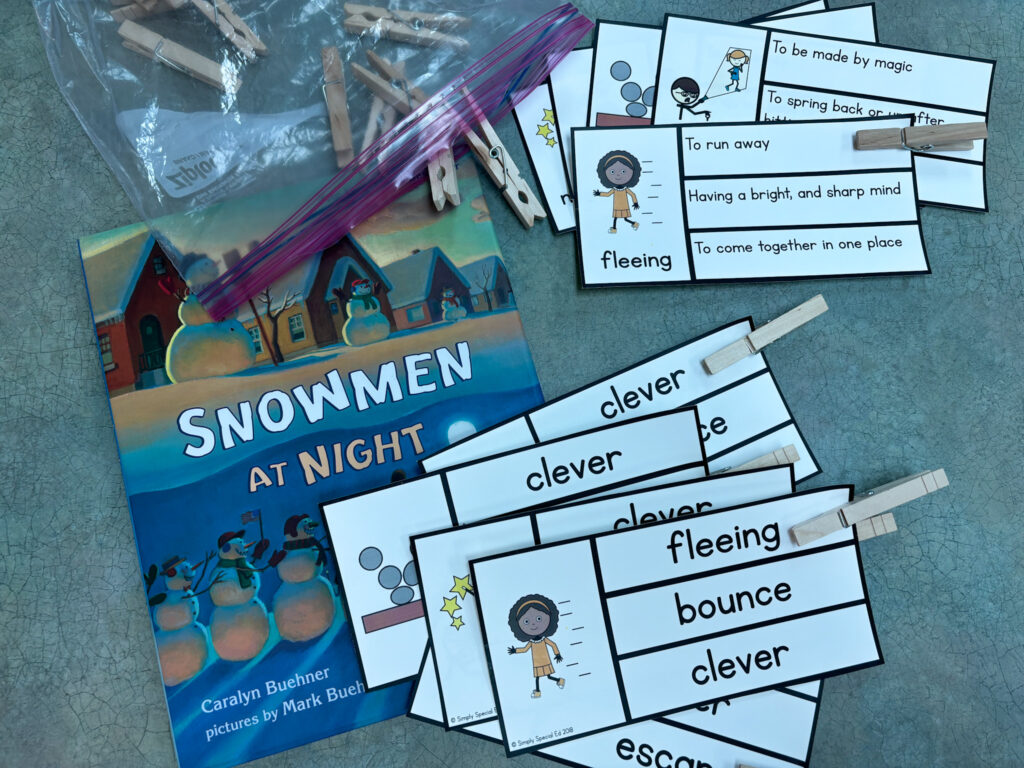 Vocabulary clips cards sit close to the story, "Snowmen at Night"