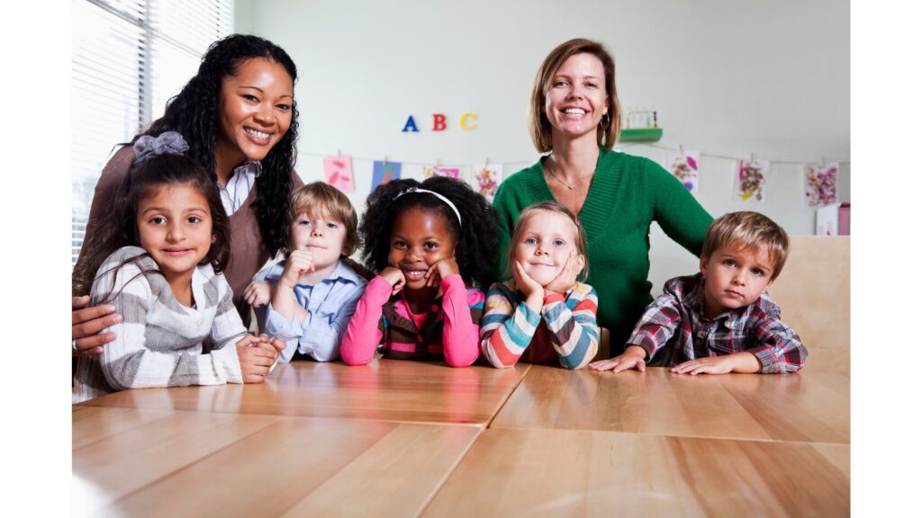 Image showing two adults and five children.