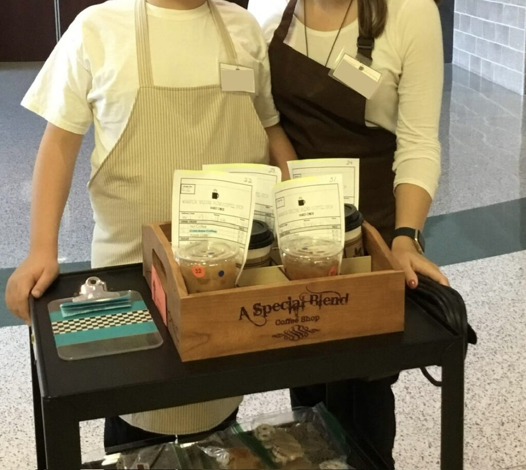 student and OT at a coffee cart delivery job