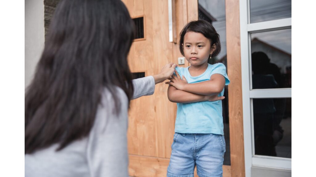 Image of a behavioral paraprofessional handling a student displaying behavior