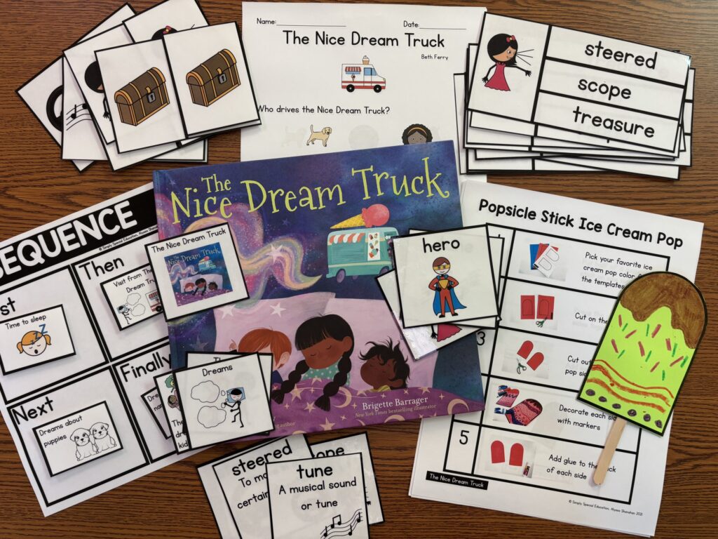 A book with all its book companion pieces are laid on a table top, including visuals, vocabulary, sequencing, and a craft with visual steps.