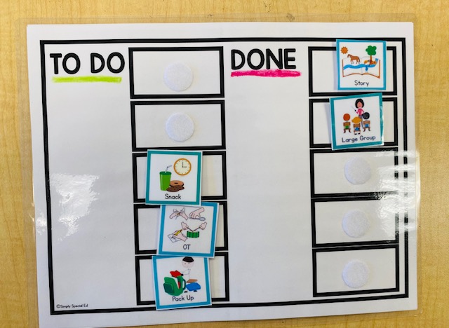 A personal visual schedule with "to do" and "done" columns, each with velcroed symbols