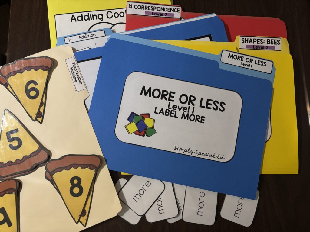 math file folders lay on a table top