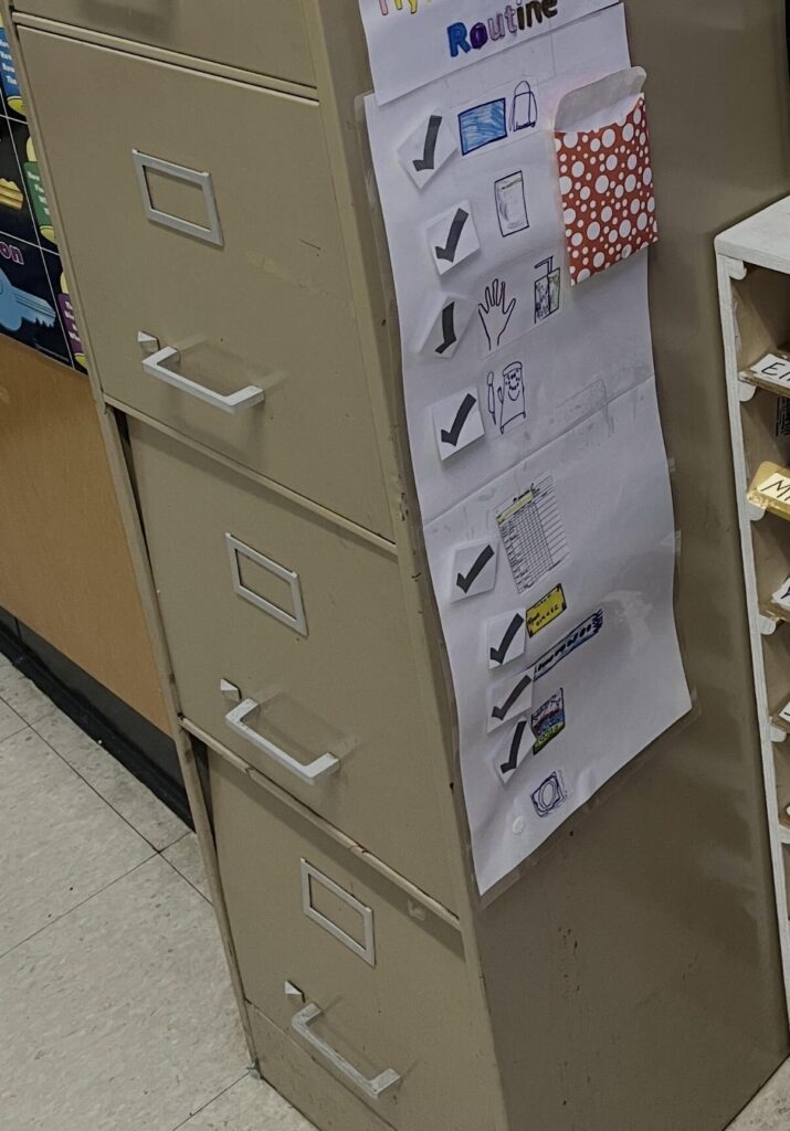 File cabinet with a student morning routine schedule
