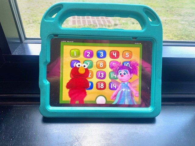 an ipad with a math game shown in the screen