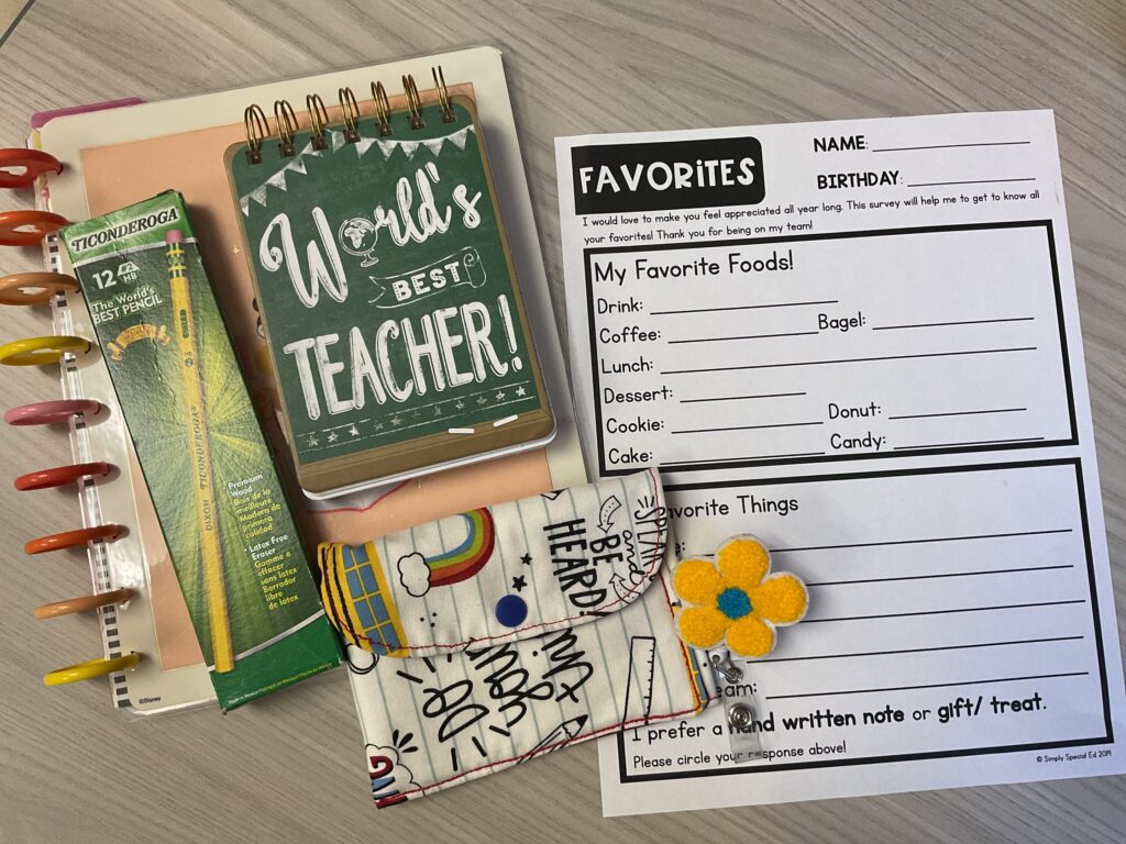 Survey lays on a desk with other teacher tools