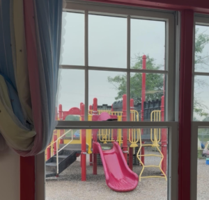 IEP Present Levels Playground with a red slide