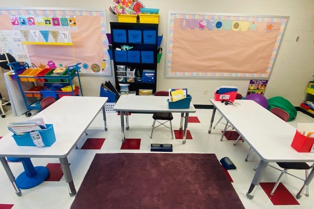 A view of rectangular tables in a resource room classroomclas