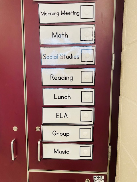 A blank whole-class schedule on a wall in a classroom